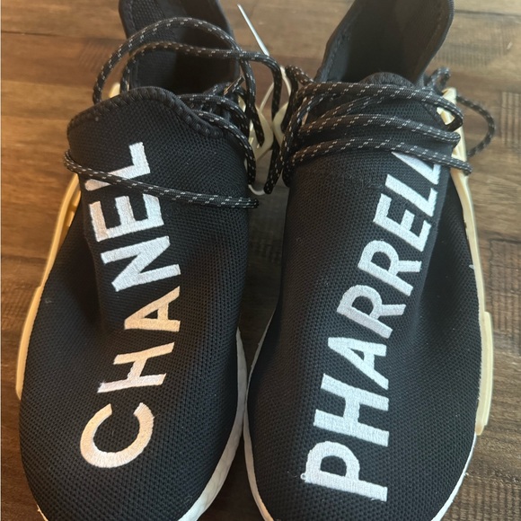 CHANEL Other - CHANEL Black and White Pharrell Sneakers